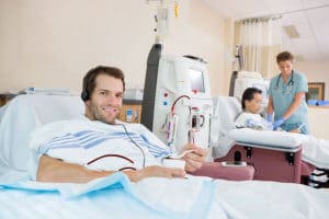 Patient listening music during dialysis
