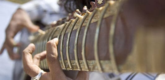 Man playing the sitar