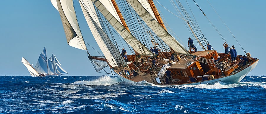 Classic yacht under full sail at the regatta