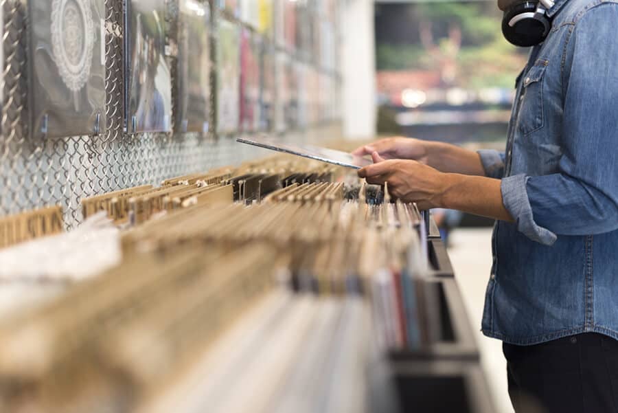 Browsing vinyl album in a record store