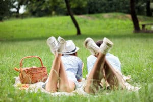 Couple enjoying relaxing picnic time in a park